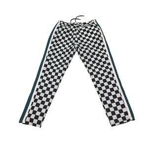 Fila Racer pants with black and white checkered pattern and green stripes